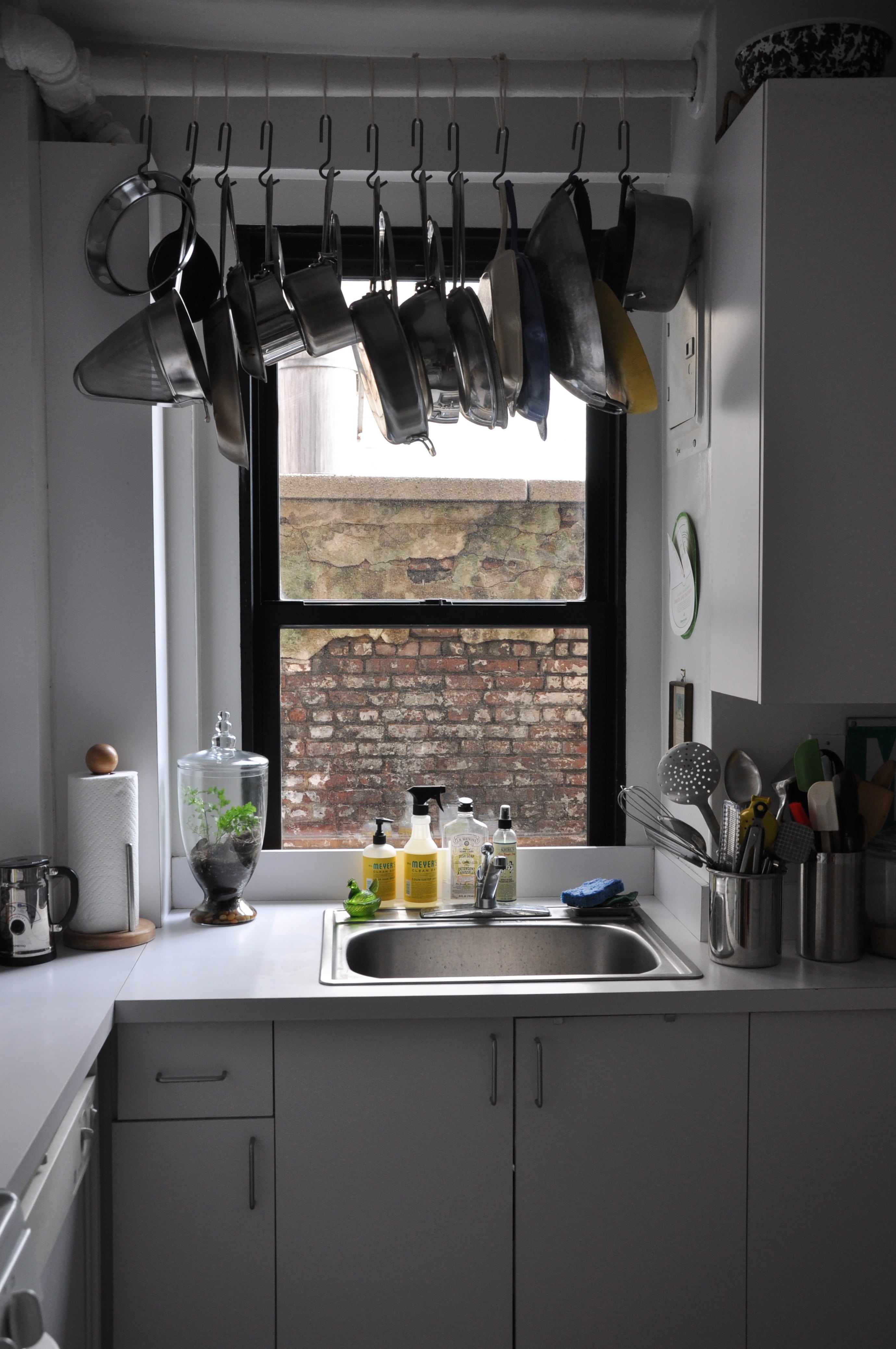 Hanging-pots-and-pans-creates-more-storage-space