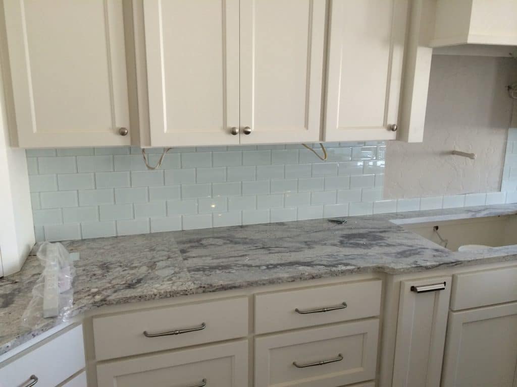 A-tiled-backsplash-in-a-neutral-kitchen-under-construction-kitchen-remodel